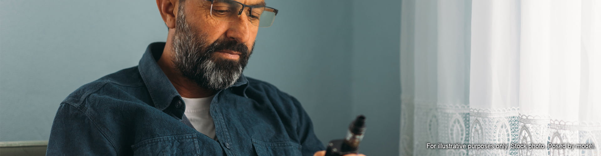 Man inspecting vape not working